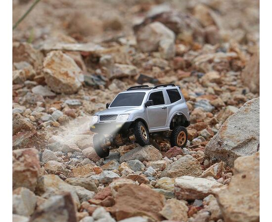 Радиоуправляемая машинка Sniclo 1:64 SNT V65 Mitsubishi Pajero 3013 Kit, Комплектация: Машинка + пульт, Цвет: Серебристый, изображение 2